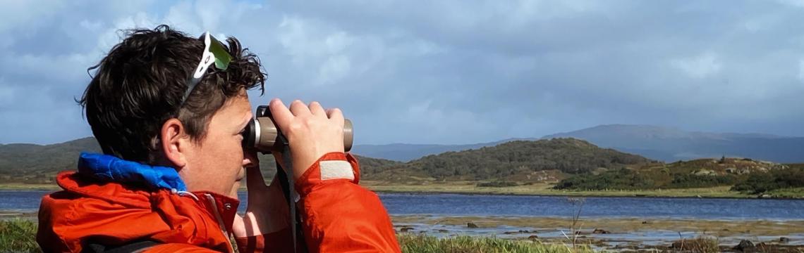 Lucy bird watching on the west coast of Scotland